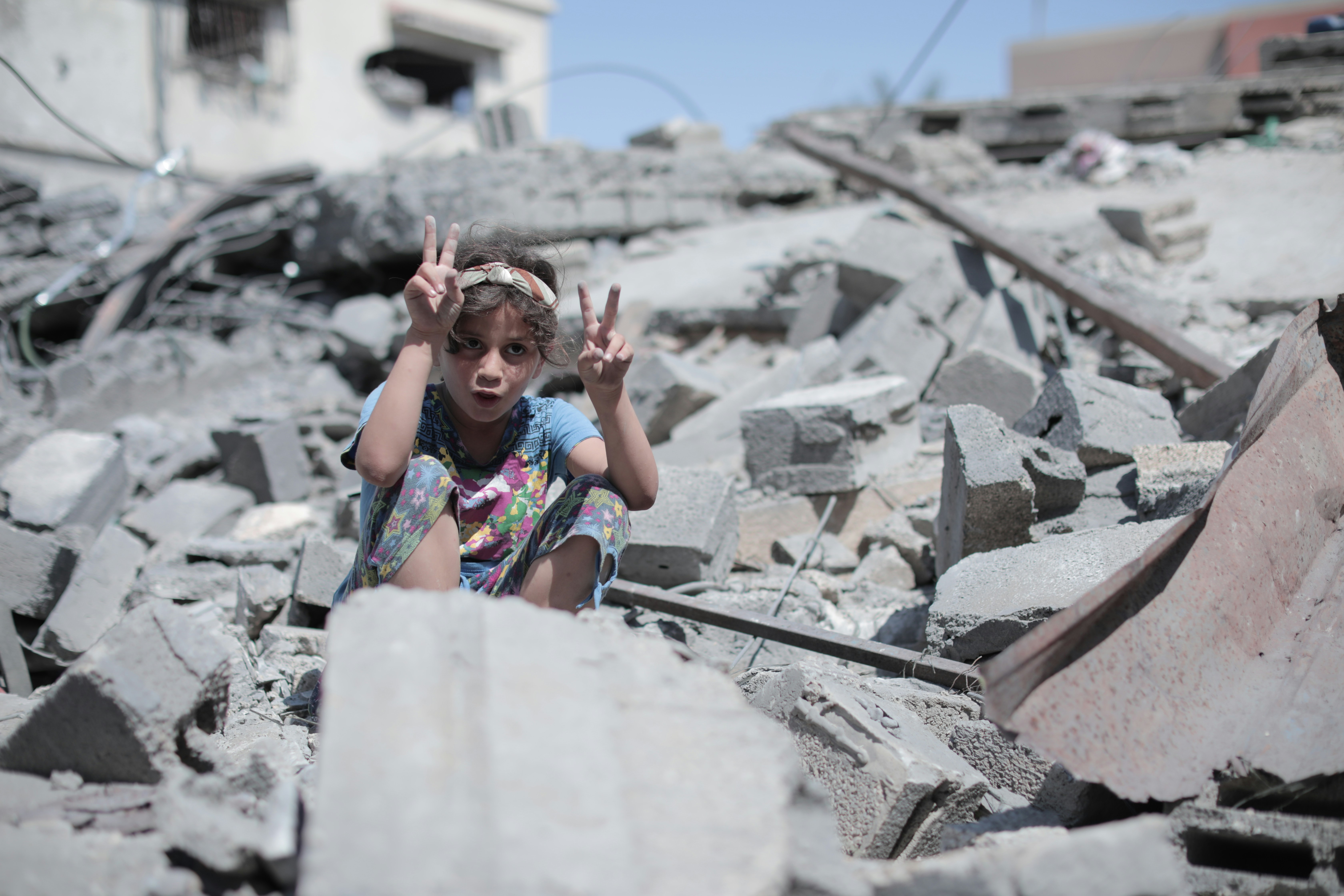 Child among rubble